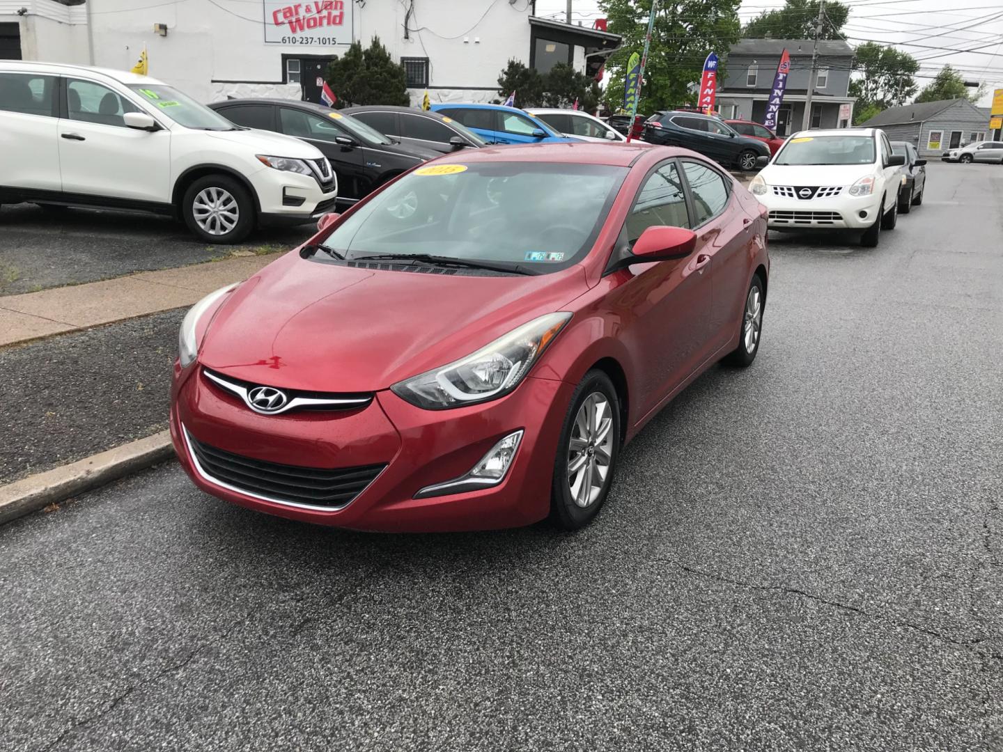 2015 Red /Gray Hyundai Elantra SE (5NPDH4AE7FH) with an 1.8 V4 engine, Automatic transmission, located at 577 Chester Pike, Prospect Park, PA, 19076, (610) 237-1015, 39.886154, -75.302338 - Photo#2